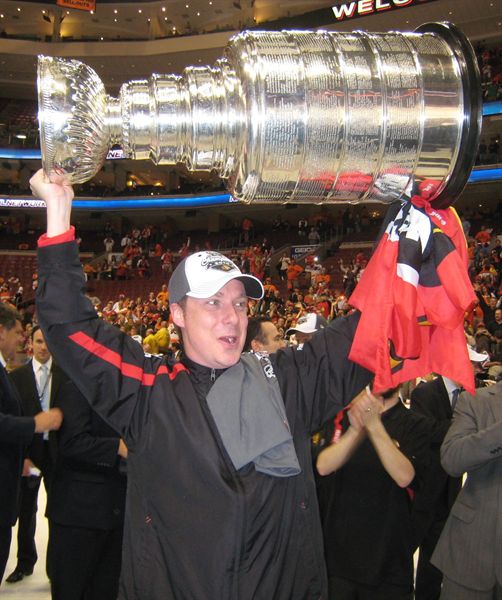 AthletiCo's Jeff Thomas celebrates the Blackhawks Championship.