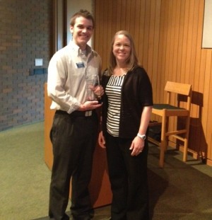 David Kolzow accepts this year's Zach Gregory Patient Satisfaction Award.