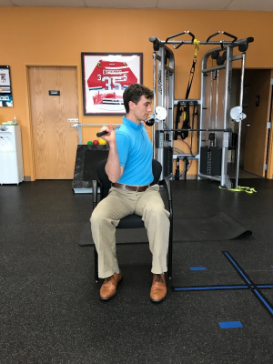 golf off season training seated trunk rotation with club