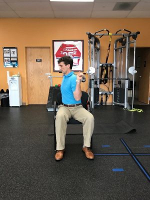 golf off season training seated trunk rotation with club