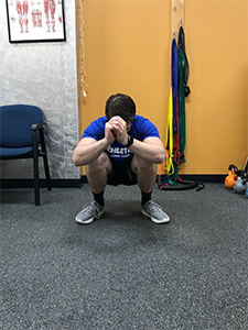 Squat with External Rotation Stretch